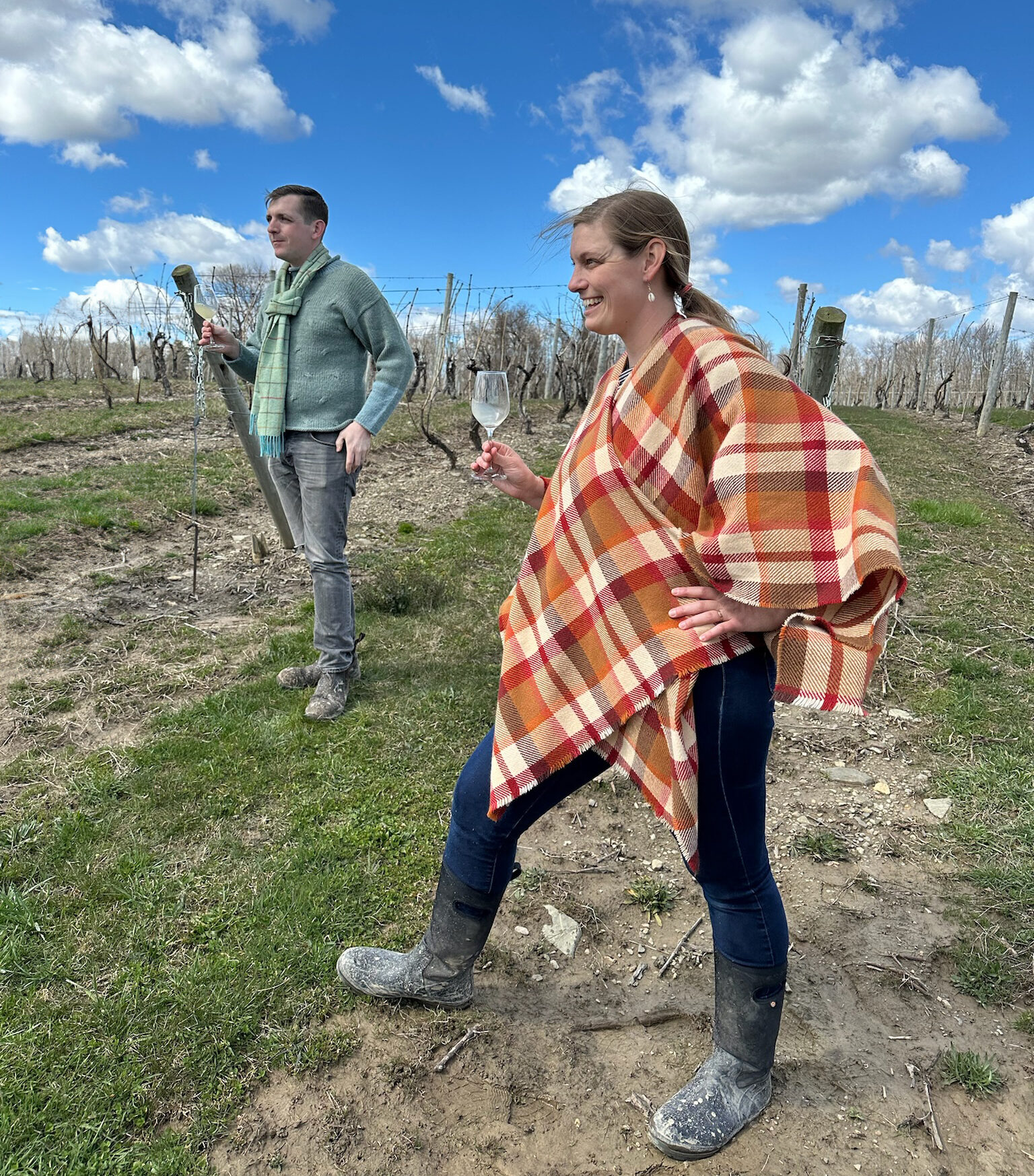 Kelby James Russell (left) and his wife Julia Rose Hoyle (right) conduct a muddy outdoor tasting. 
